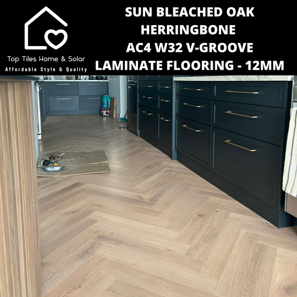 Sun Bleached Oak Herringbone AC4 W32 V-Groove Laminate Flooring - 12mm